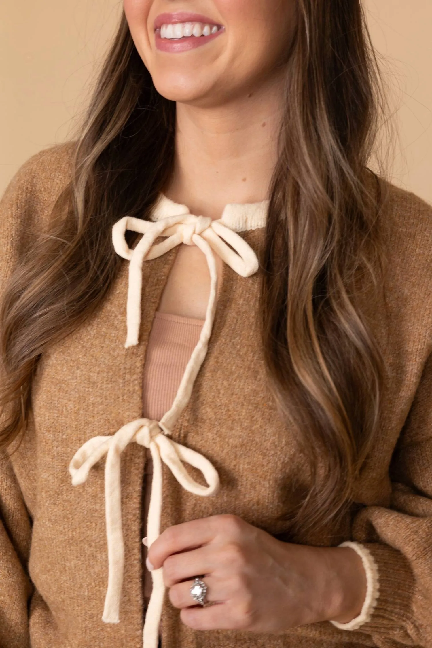 Brenna Bow Sweater In Brown